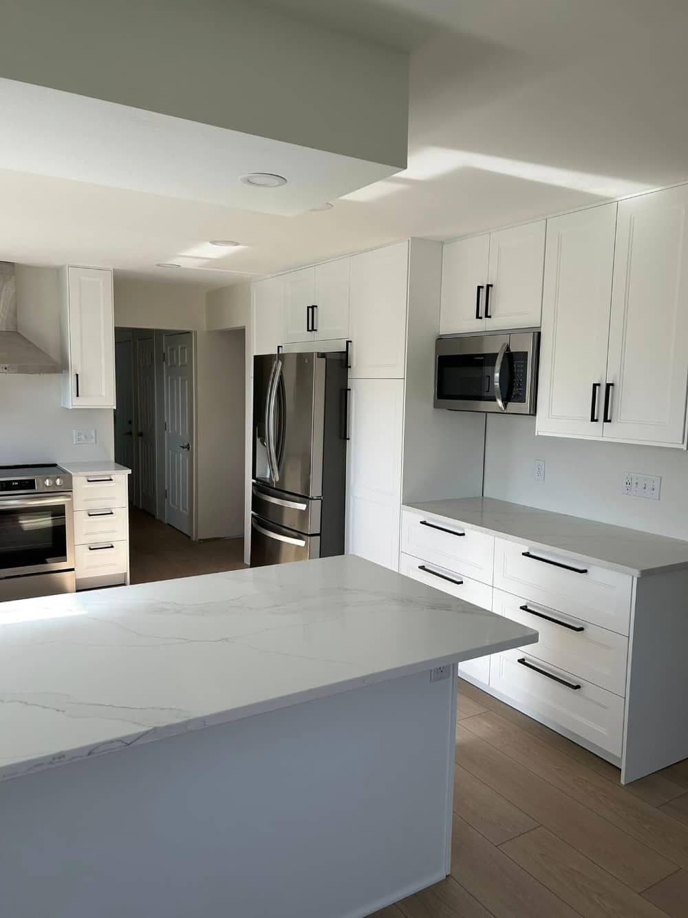 kitchen project with fridge and stove view